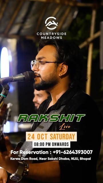 A singer performing live at Countryside Meadows