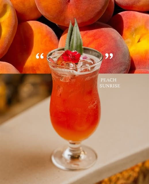 Peach Sunrise mocktail with a pineapple leaf garnish